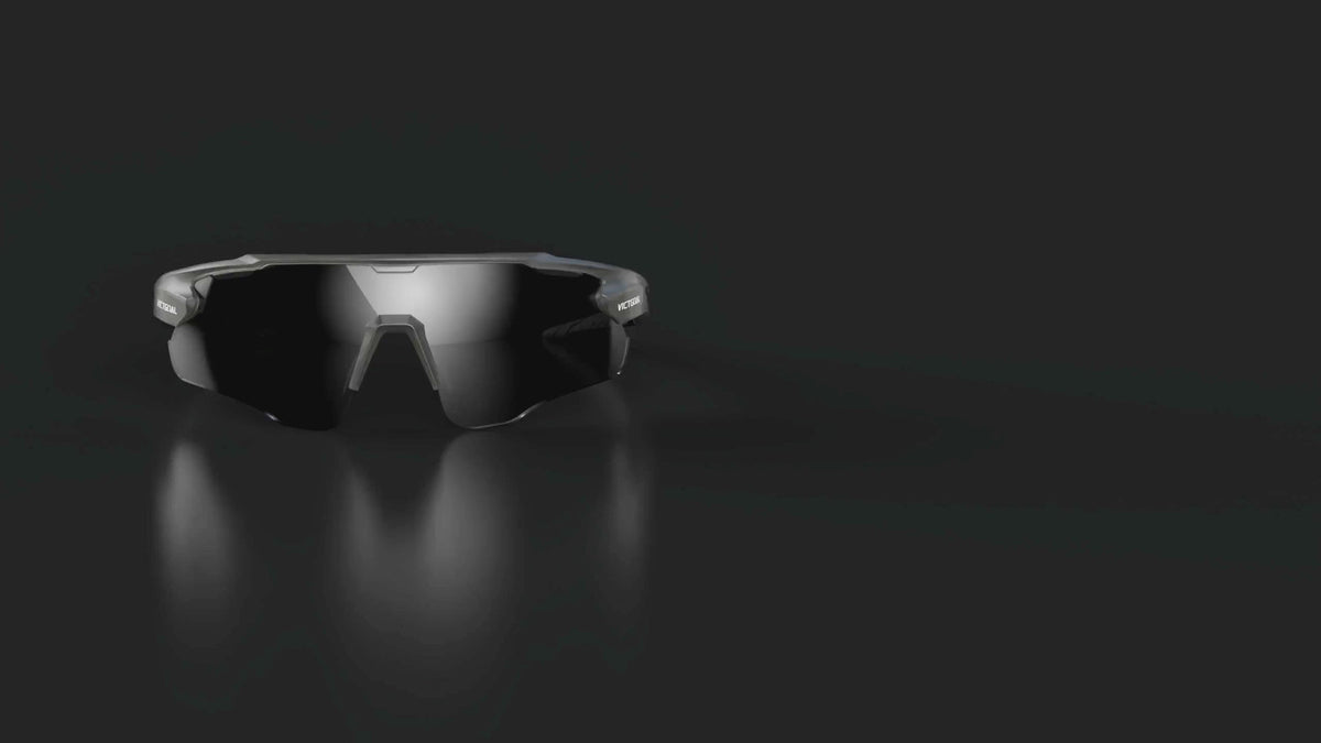 Black polarized sports glasses displayed against a dark background