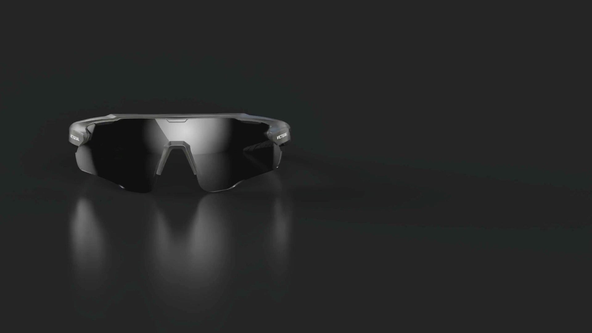 Black polarized sports glasses displayed against a dark background