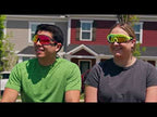 Two adults wearing colorful polarized photochromic cycling glasses outdoors