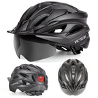 Front, side and rear views of black helmet with tinted shield and rear light